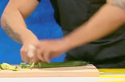Bodybuilding chef chops cucumber blindfolded for world record