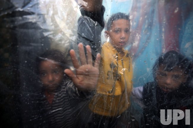 Displaced Palestinians Take Refuge in UN Schools
