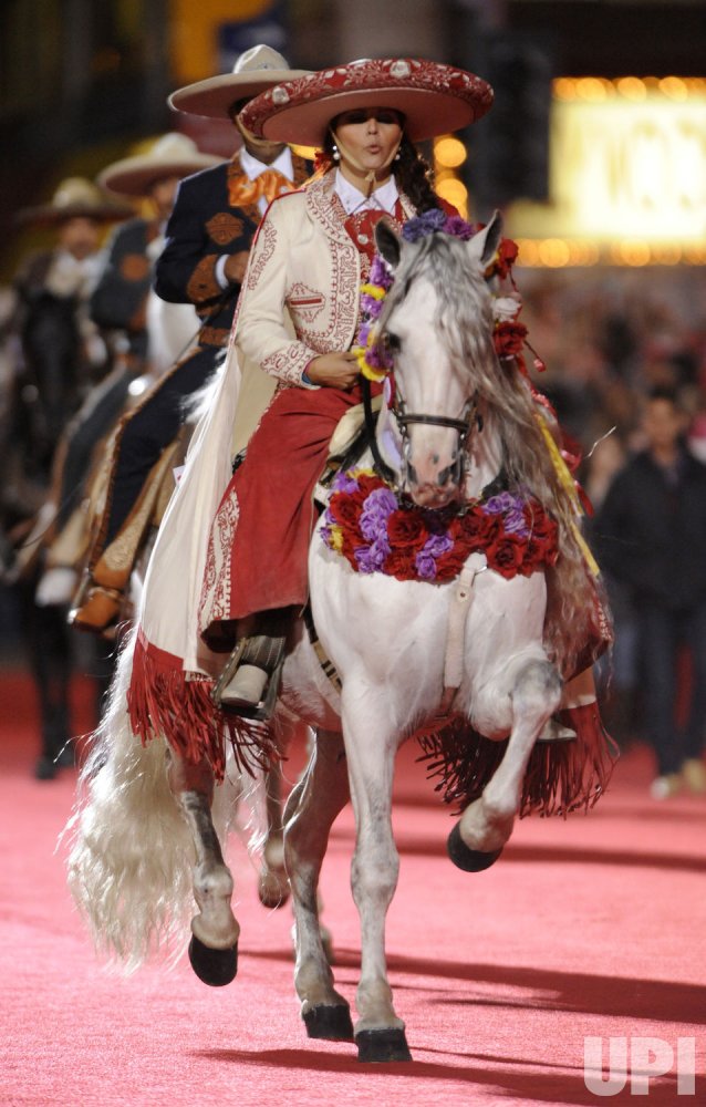 Performers on horseback ride in the Hollywood Christmas Parade in Los Angeles