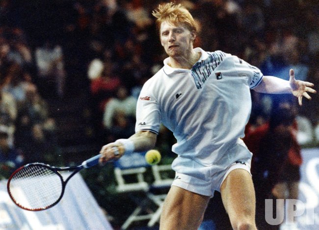 Boris Becker grimaces as he hits a forehand during the U.S. Pro ...