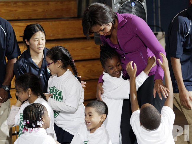 First Lady Michelle Obama meets with Harlem Children at a "Let's Move" event at the New York Police Athletic Center in New York