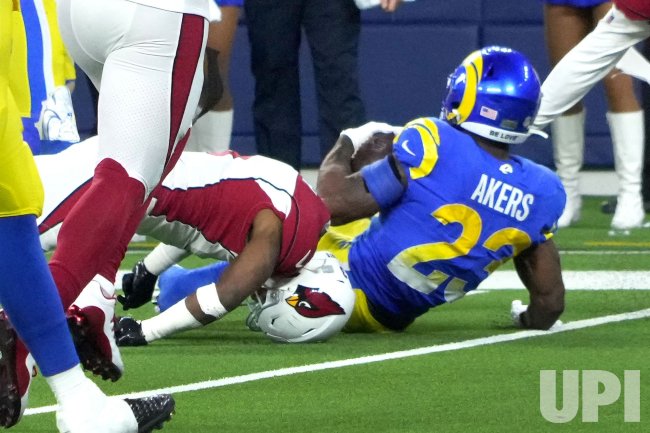 Cardinals' Buddy Baker Injures His Neck Tackling Rams Cam Akers in Wild Card Playoff Game