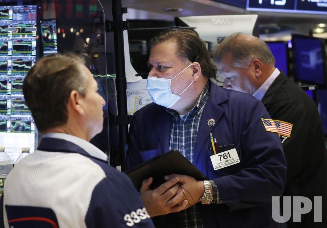 Traders Work on the Floor of the New York Stock Exchange