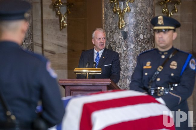 Photo: Casket of Rep Young Lies in State at the Capitol in ...