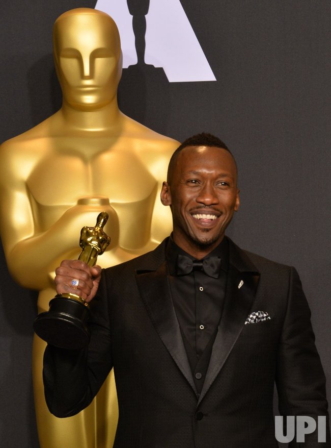 Actor Mahershala Ali appears backstage with his Oscar at the 89th annual Academy Awards in Hollywood