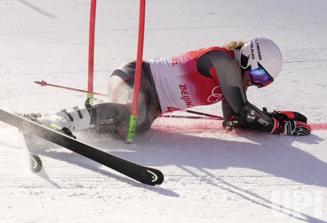 Tviberg of Norway crashes through a gate during the Mixed Team Parallel event at the Winter Olympics