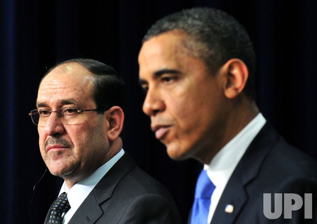 President Barack Obama holds a press conference with Iraqi Prime Minister Nouri al-Malik in Washington