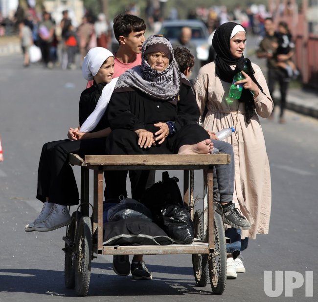 Palestinian Families Flee the Israeli Bombing of Gaza City