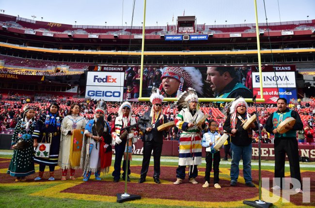 Photo: Blackfeet Nation performs traditional music at Redskins