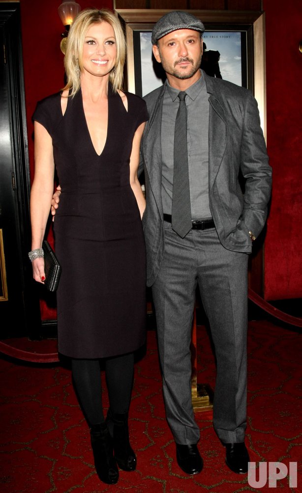Faith Hill and Tim McGraw attend "The Blind Side" movie premiere in New York