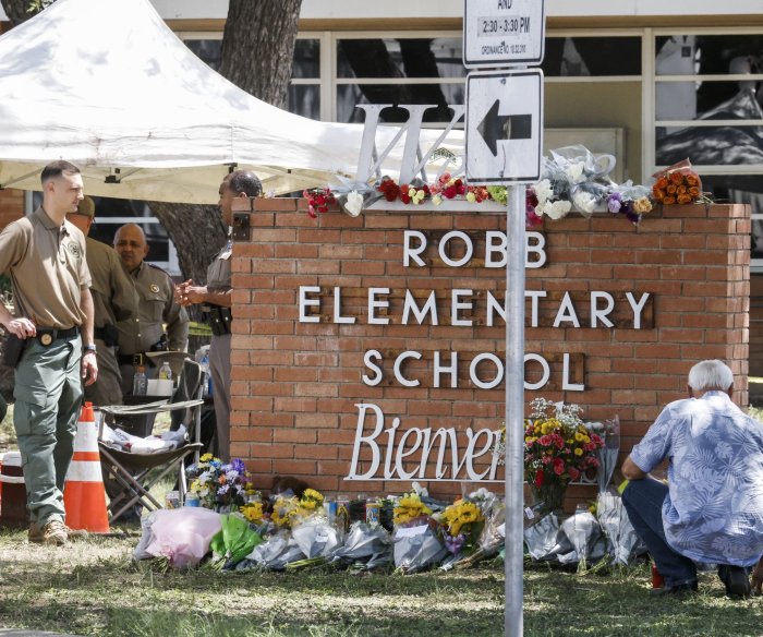Police: Texas shooter slipped by school cop; mom says gunman not a 'monster'