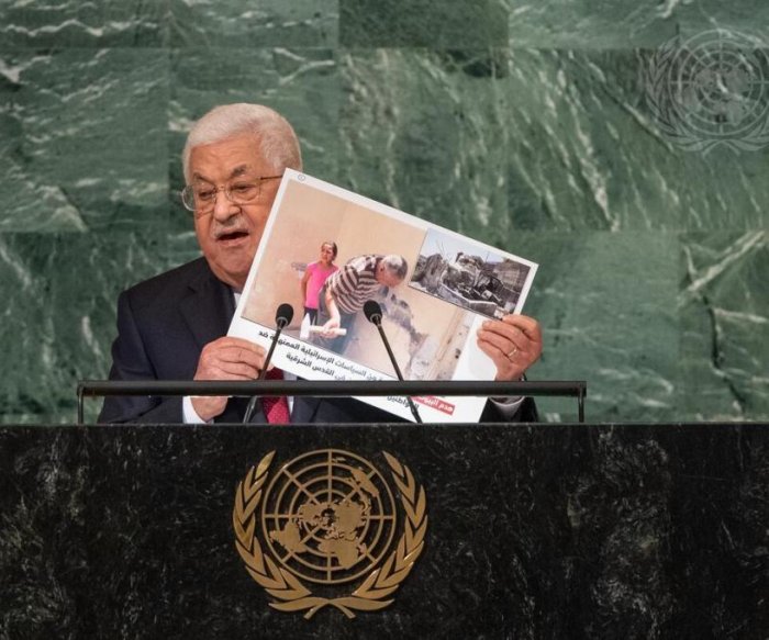 Abbas says Israel doesn't want peace, should be punished for journalist's death