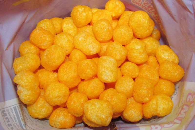 Thousands of pounds of cheese balls spill onto Maryland highway