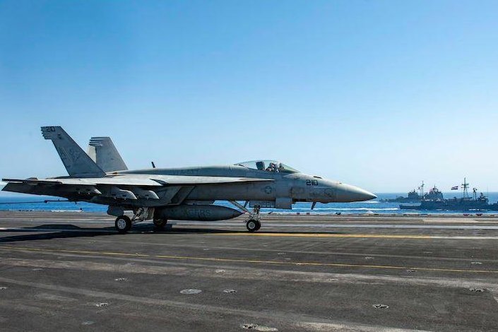 An F/A18-E Super Hornet fighter plane of Carrier Air Wing 3 sits aboard the aircraft carrier USS Dwight D. Eisenhower, which returned home on Tuesday after a seven-month deployment. Photo courtesy of U.S. Navy