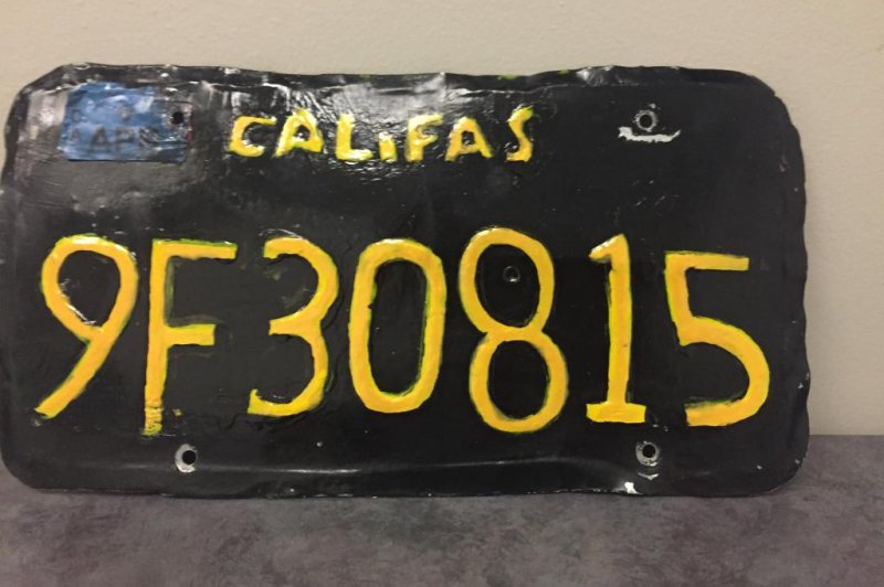 Police in California said a tractor trailer was pulled over when a motorcycle officer noticed the license plate was a fake that listed the wrong name for the state. Photo courtesy of the Moorpark Police Department