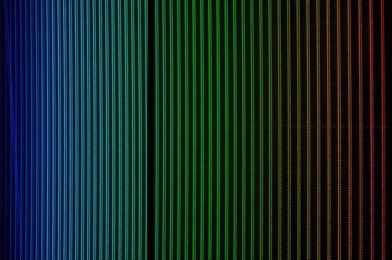 Researchers used a pair of frequency combs, which produce a spectrum of sharp, equally spaced frequency lines, to analyze the spectral properties of molecules in a gas mixtures. Photo by ESO/CC