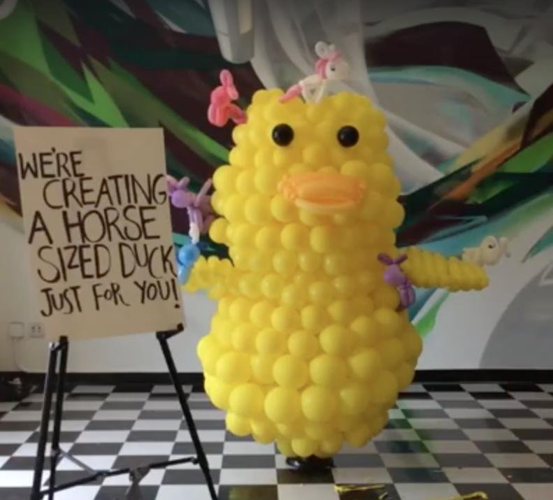 Reddit created a "horse-sized duck" in reference to the popular Internet question, "Would you rather fight 100 duck-sized horses or 1 horse-sized duck?" The duck was made entirely from balloons during a two-hour live-stream from the Internet forum's San Francisco headquarters. Screen capture/Reddit/Facebook