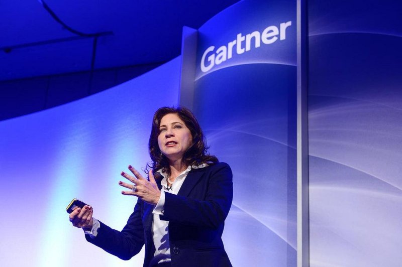 A speaker at a 2015 IT consulting summit put on by the consulting firm Gartner in London. Gartner has agreed to purchase the human resources consulting firm CEB in a deal worth $2.6 billion in cash and stock. Photo courtesy Gartner, Inc.