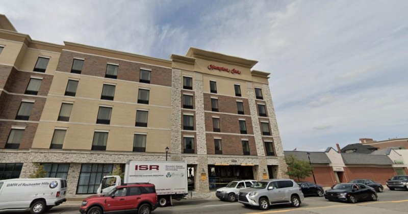 A 38-year-old man was arrested Thursday night following an hourslong standoff with police that began when he allegedly shot and killed a clerk at the Hampton Inn in Dearborn, Mich. Image courtesy of Google Maps/<a href="https://www.google.com/maps/@42.3047305,-83.2500857,3a,75y,359.63h,111.95t/data=!3m6!1e1!3m4!1so2VT-eDE6fja-liZ9fYiPQ!2e0!7i16384!8i8192">Website</a>