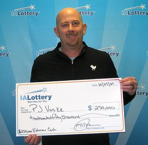 P.J. and Libby Vaske of Dakota Dunes, S.D., said they bought the last $20 scratch-off lottery ticket from an Iowa store and revealed a $250,000 prize when they scratched it off Christmas morning. Photo courtesy of the Iowa Lottery