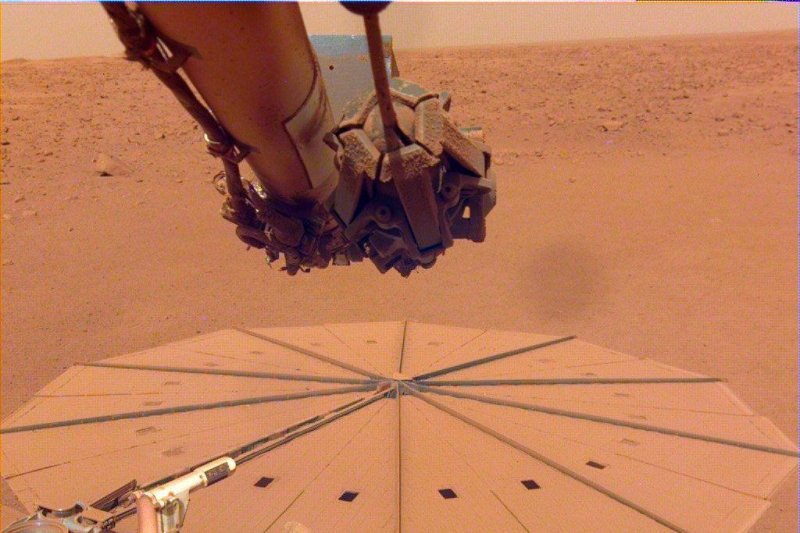 As the Mars InSight lander's power diminishes because of dust on its solar panels, preventing it from charging, NASA engineers plan to power down most of its instruments -- but hold out hope it will be able to wake back up at some point. Photo courtesy NASA/Twitter