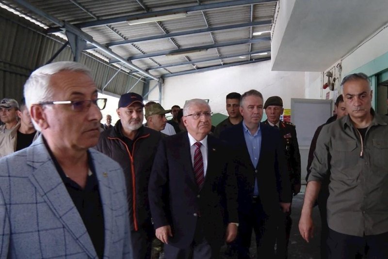 Turkish Defense Minister Yasar Guler (C) on Saturday visited the site of an explosion at a rocket factory in Ankara. Five people were killed in the blast. Photo by of Turkish Ministry of Defense/UPI