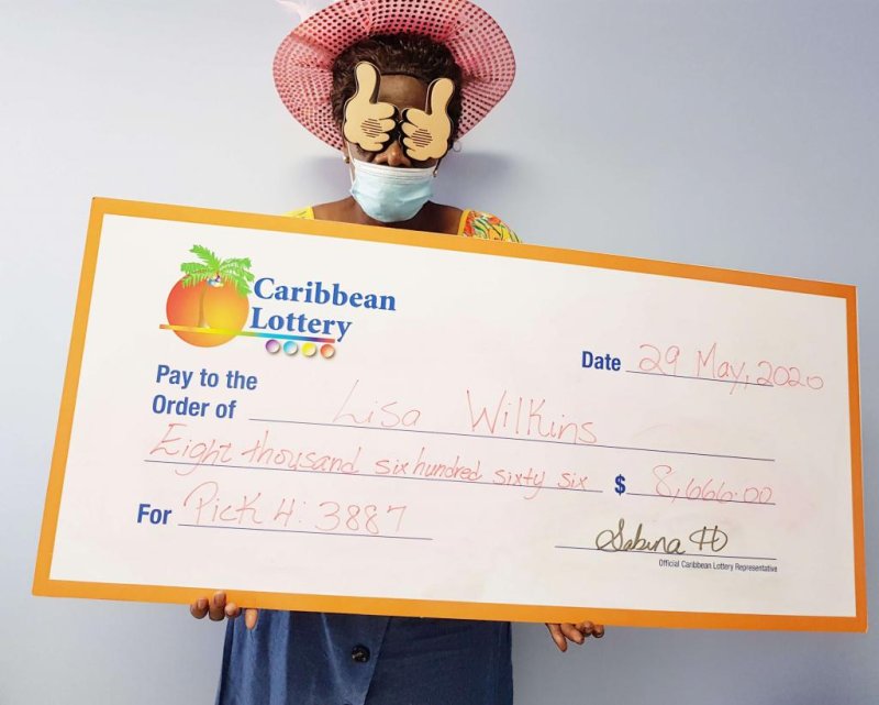 A woman from the Caribbean island of St. Kitts collected her second $8,666 jackpot after winning a Pick 4 lottery drawing for the second time. Photo courtesy of the Caribbean Lottery