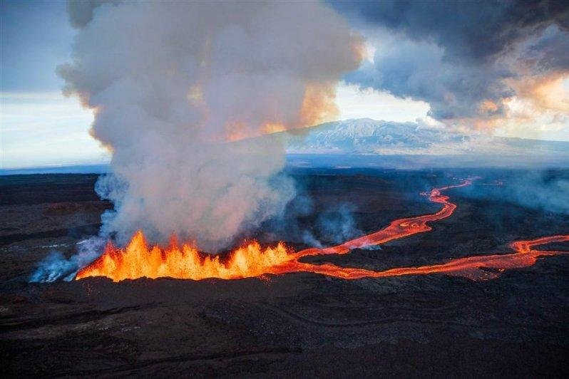 Lava continues to flow from the world's largest active volcano, Mauna Loa, which erupted last week. Photo by Bruce Omor/Paradise Helicopter/EPA-EFE