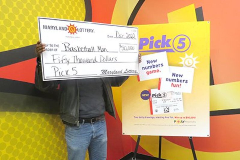 A Maryland man enlisted the help of a co-worker to buy his Pick 5 lottery ticket -- leading to both men winning big in the drawing. Photo courtesy of the Maryland Lottery