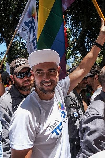 Israeli Knesset member Amir Ohana at Jerusalem's 2015 Gay Pride parade. A bill Ohana sponsored, classifying attacks targeting transgender people as hate crimes, was pulled from consideration Wednesday in the Knesset. <a class="tpstyle" href="https://commons.wikimedia.org/wiki/File:Amir_Ohana.jpg">Photo by Igor Zeiger/Wikimedia</a>