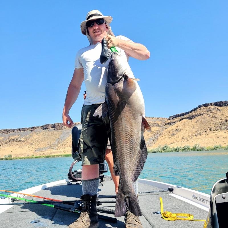 Paul Newman broke an Idaho state record when he reeled in a massive catfish measuring 42.5 inches long. Photo courtesy of the Idaho Department of Fish and Game