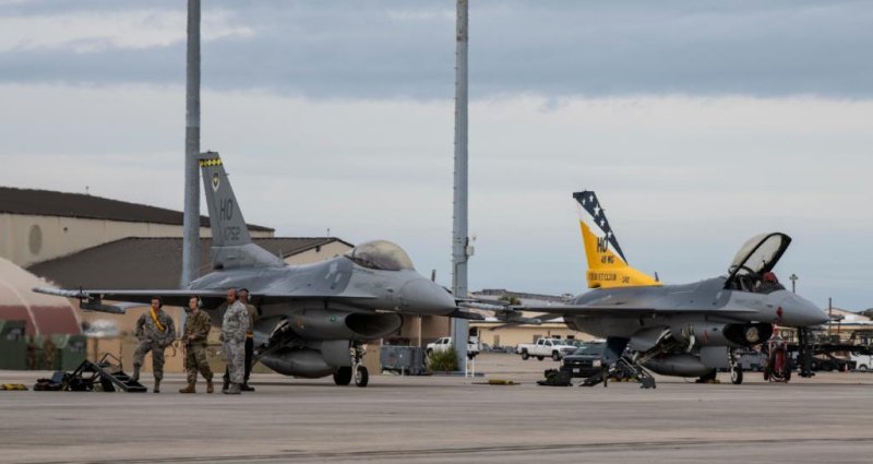 F-16 fighter planes line up at Tyndall AFB, Fla., for air combat and live-fire exercises. Photo by Senior Airman Stefan Alvarez/U.S. Air Force
