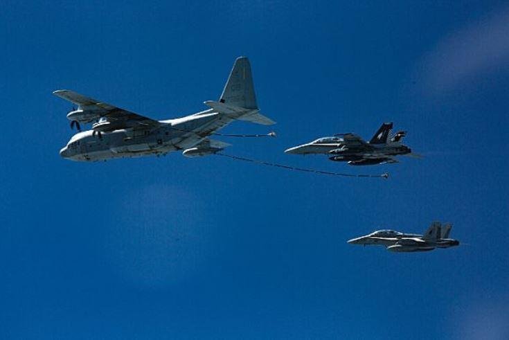 Two F/A-18D Hornets approach a Lockheed KC-130J Hercules during an aerial refueling exercise on October 13, 2016. On Thursday, an F/A-18D Hornet and KC-130J collided off the coast of Japan. Photo by <a class="tpstyle" href="https://www.navy.mil/view_image.asp?id=227801">Trevor Statz/U.S. Navy</a>