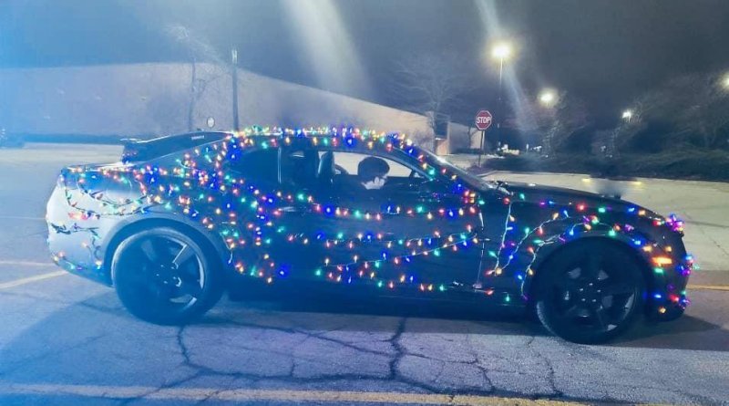 Tyler Kamholz, 18, was pulled over and given a warning by a Wisconsin State Patrol trooper who spotted him driving around with his car covered in Christmas lights. Photo courtesy of the Wisconsin State Patrol