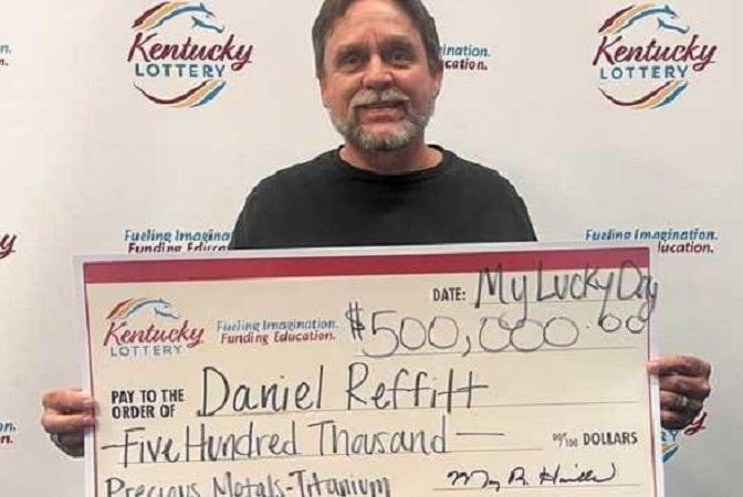 Daniel Refitt won a $500,000 prize from a Kentucky Lottery scratch-off ticket and celebrated by handing out $100 each to some nearby store employees. Photo courtesy of the Kentucky Lottery