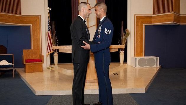 Sgt. Erwynn Umali and Will Behrens wed on a military base in New Jersey. (Image credit Jeff Sheng via Daily Mail)