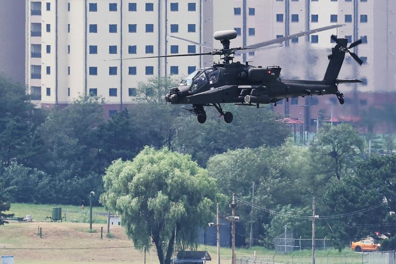 A U.S. Apache helicopter flies over U.S. Army base Camp Humphreys in Pyeongtaek, South Korea, on Monday as South Korea and the United States' joint annual military exercise, the Ulchi Freedom Shield, kicked off an 11-day run. Photo by Yonhap