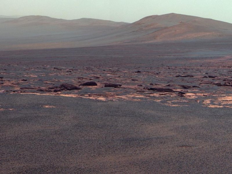 A portion of the west rim of Endeavour crater sweeps southward in this color view from NASA's Mars Exploration Rover Opportunity. Credit: NASA/JPL-Caltech/Cornell/ASU