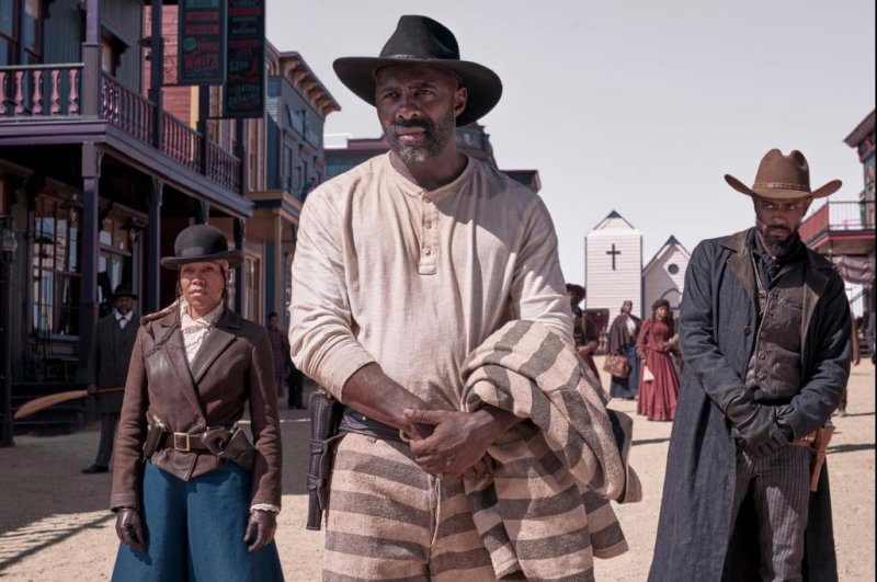 Regina King, Idris Elba and LaKeith Stanfield, from left to right, star in the new Western film "The Harder They Fall." Photo courtesy of Netflix