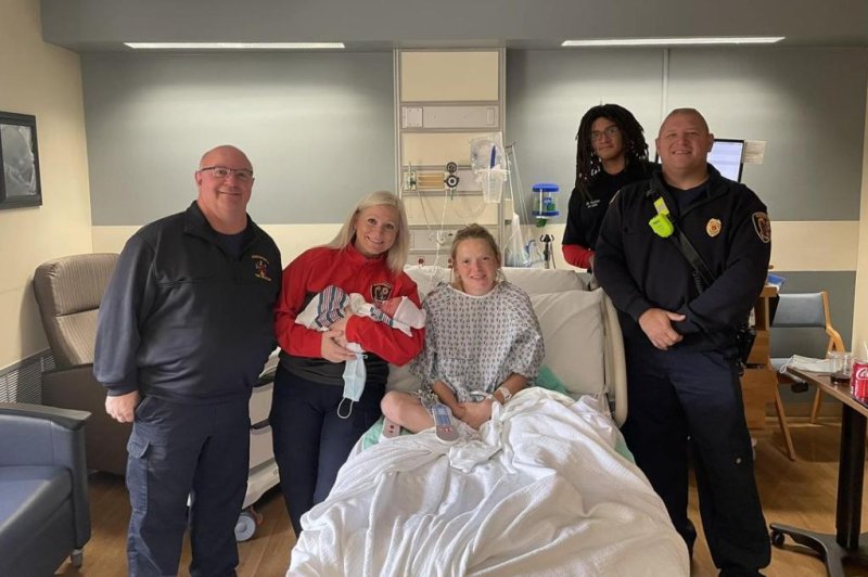 A baby was born in an ambulance parked in her family's Westfield Township, Ohio, driveway less than an hour after her mother went into labor. <a href="https://www.facebook.com/WestfieldFD/posts/pfbid0JMiuBKLnttyNCptLy7HQiDt4Utu2H6GcpYtYGkWqy9ANGBPM8kQxJDDje2uv2rpJl">Photo courtesy of Westfield Fire and Rescue/Facebook</a>