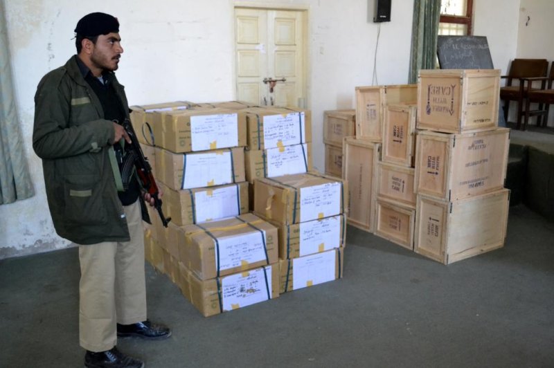 Pakistani security guard stands alert near ballot papers ahead of Saturday's Balochistan provincial election, the first since 2005. UPI Next/Matiullah