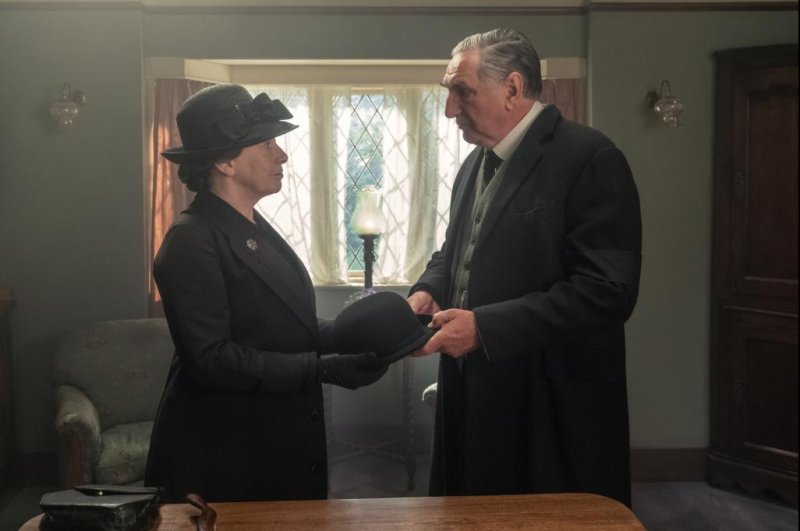 Phyllis Logan (L) and Jim Carter can now be seen in "Downton Abbey: A New Era." Photo courtesy of Focus Features
