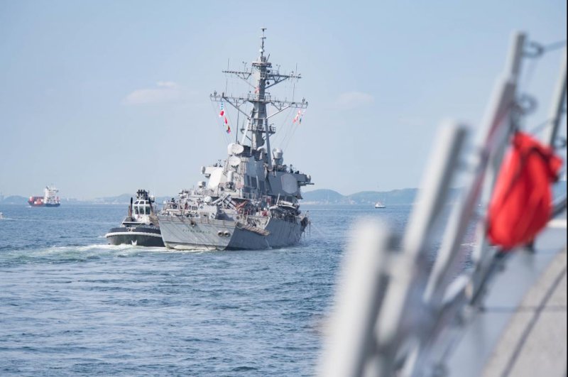 USS Fitzgerald returning to Fleet Activities Yokosuka following its collision with a civilian ship. File Photo courtesy of the U.S. Navy