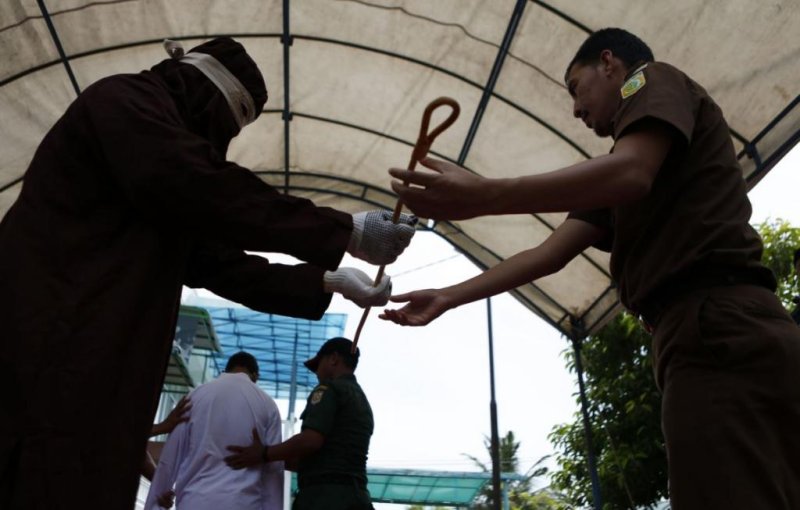 A mosque in Banda Aceh, Indonesia, prepares for a public caning of people convicted of violating Sharia law on April 18. On Tuesday, two men wire caned 83 times each for gay sex, the first time gay men have been caned under Sharia law in the province. Photo by Hotli Simunjuntak/EPA