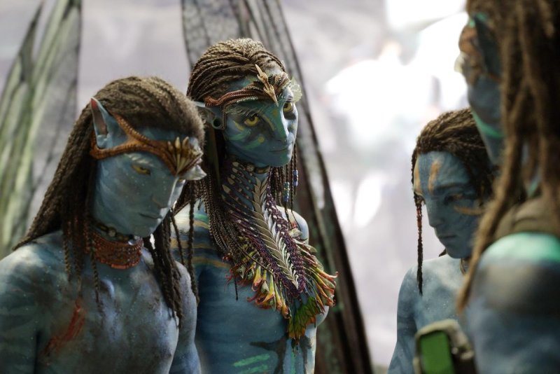 From left to right, Jamie Flatters, Zoe Saldana, Britain Dalton and Sam Worthington star in "Avatar: The Way of Water." Photo courtesy of 20th Century Studios