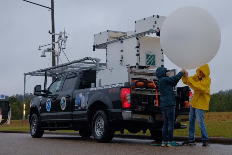 Researchers prepare to launch an experimental weather balloon in Alabama in 2022. Photo courtesy of the National Oceanic and Atmospheric Administration