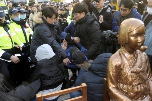 A second statue dedicated to "comfort women" installed in Busan is the center of a heated dispute between Japan and South Korea. But Japanese tourists have increased in number, according to a local immigration bureau. File Photo by Yonhap