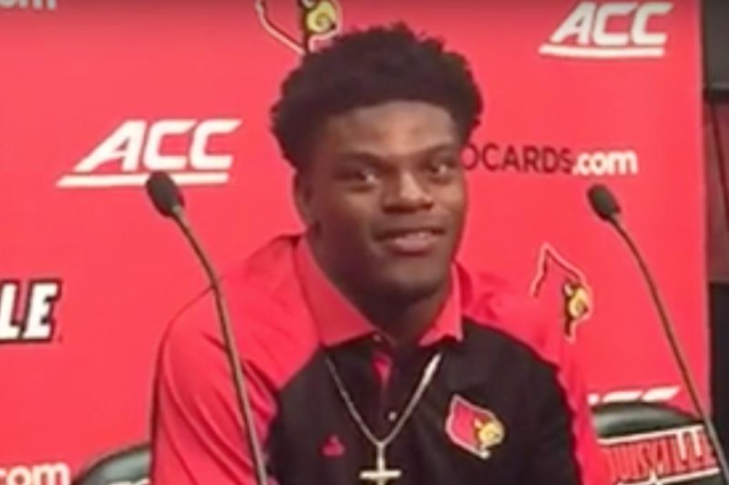Lamar Jackson (eight TDs) leads Louisville to rout of Charlotte
