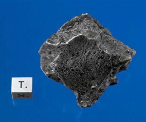 A look at the Martian meteorite that struck Morocco in July 2011 and was recovered in Dec. 2011. Photo courtesy of Darryl Pitt of the Macovich Collection.