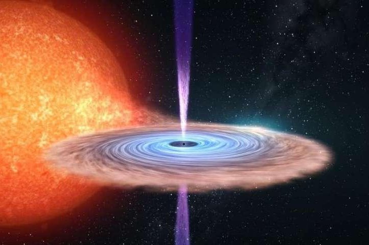 Scientists are getting closer to understanding the forces and physics that generate relativistic jets, the powerful beams of plasma ejected along the rotational axis of black holes. Photo by University of Southampton